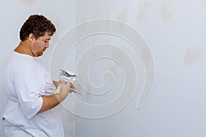 Worker work aligns with a spatula wall
