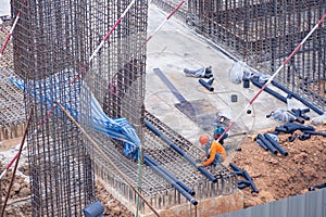 Worker is working to construct building in the construction area