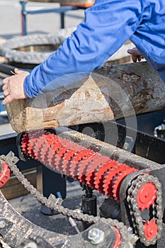 Worker works at a woodworking enterprise. wood industry. vertical photo photo