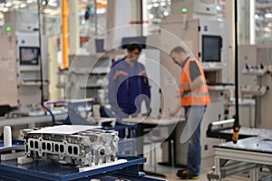 Workers in auto engines factory