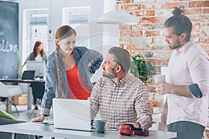 Workers brainstorming in office