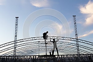 Workers buiding construction