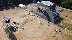 workers build a concert stage. Concept High-rise works. metal designs