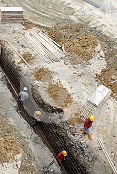 Workers at a building construction site