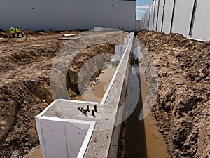 Workers building at  at an industrial construction site