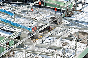 Workers on the building roof