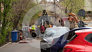 Workers carry out repair work on the city sewer.