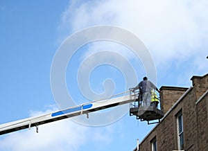Workers in cherry picker