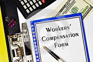Workers` compensation form - text inscription on the form in the folder of the office Registrar. photo