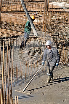 Workers on concrete works