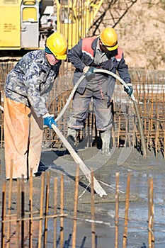 Workers on concrete works