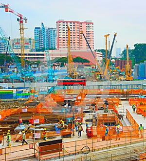 Workers construction site basement. Singapore