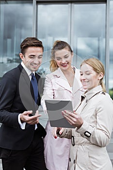 Workers of corporation with tablet