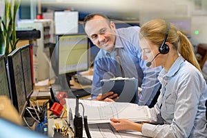 workers discussing ideas in workplace