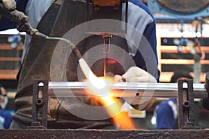 Workers check on the assembly line at the assembly bicycle bike