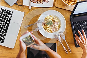 Workers eat during meetings in cafes.