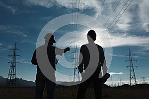 Workers at electricity station