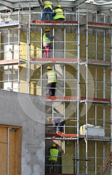 Workers on falsework