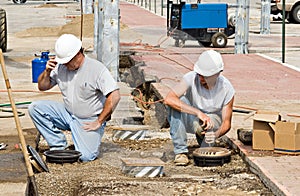 Workers Installing Lights