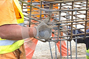 Workers installing reinforcement structure