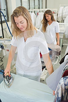 Workers laundry ironed clothes iron dry