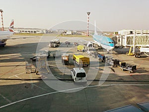 Workers loading luggage in the aircraft