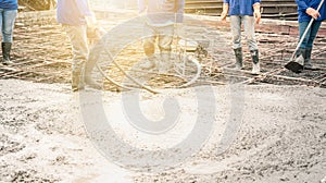 Workers man using a Vibration Machine for eliminate bubbles in concrete. after Pouring ready-mixed concrete