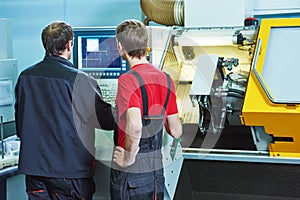 Workers at manufacture workshop