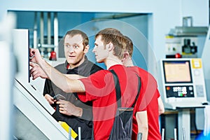 Workers at manufacture workshop