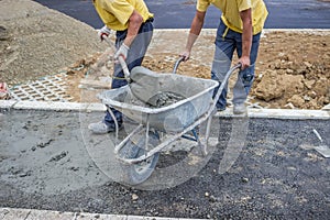 Workers Mixing concrete by hand 3