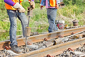 Workers preparing equipment for maintenance of the railway-Edit.tif