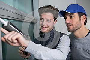 workers preparing to install new windows