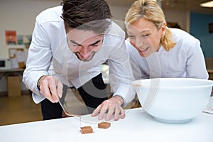 Workers on production chocolates