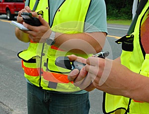 Workers recording data