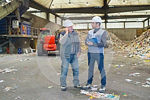 Workers on recycling plant