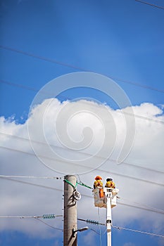 Workers Repairing Faulty Electric Power Lines