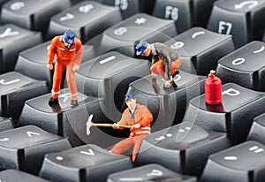 Workers repairing keyboard