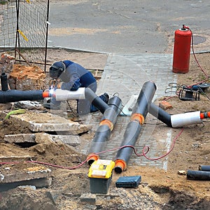 workers restore the destroyed pipeline, water supply accident, repair of the water supply system, restoration of the destroyed