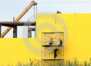 Workers on scallolding