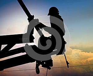 Workers setting up an electric sub station