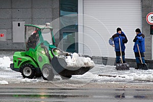 Kharkiv, Ukraine - December 12, 2018: workers and special equipment remove snow