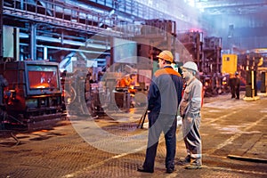 Workers in the steel mill. Metallurgical industry.