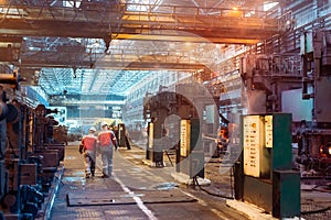 Workers in the steel mill. Metallurgical industry.