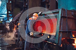 Workers in the steel mill. Metallurgical production or plant.