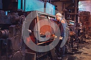 Workers in the steel mill. Metallurgical production or plant.