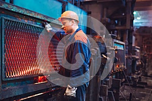 Workers in the steel mill. Metallurgical production or plant.