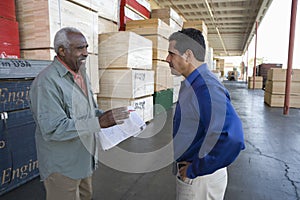 Workers Stocktaking In Timber Factory