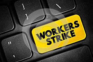 Workers strike - collective refusal by employees to work under the conditions required by employers, text concept button on