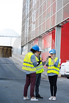 workers talking in shipping yard