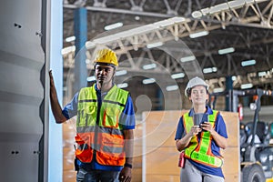 Workers team taking inventory in factory warehouse, Warehouse worker team checking containers box, Foreman workers working in